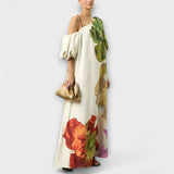 Skylar - Robe maxi à imprimé floral, col asymétrique et manches bouffantes
