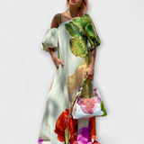 Skylar - Robe maxi à imprimé floral, col asymétrique et manches bouffantes