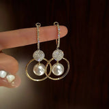 Boucles d'oreilles élégantes avec perles de culture