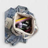 Tilda – Sac à provisions en tricot avec accent en corde