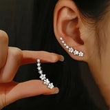 Boucles d'oreilles en strass florales luxueuses