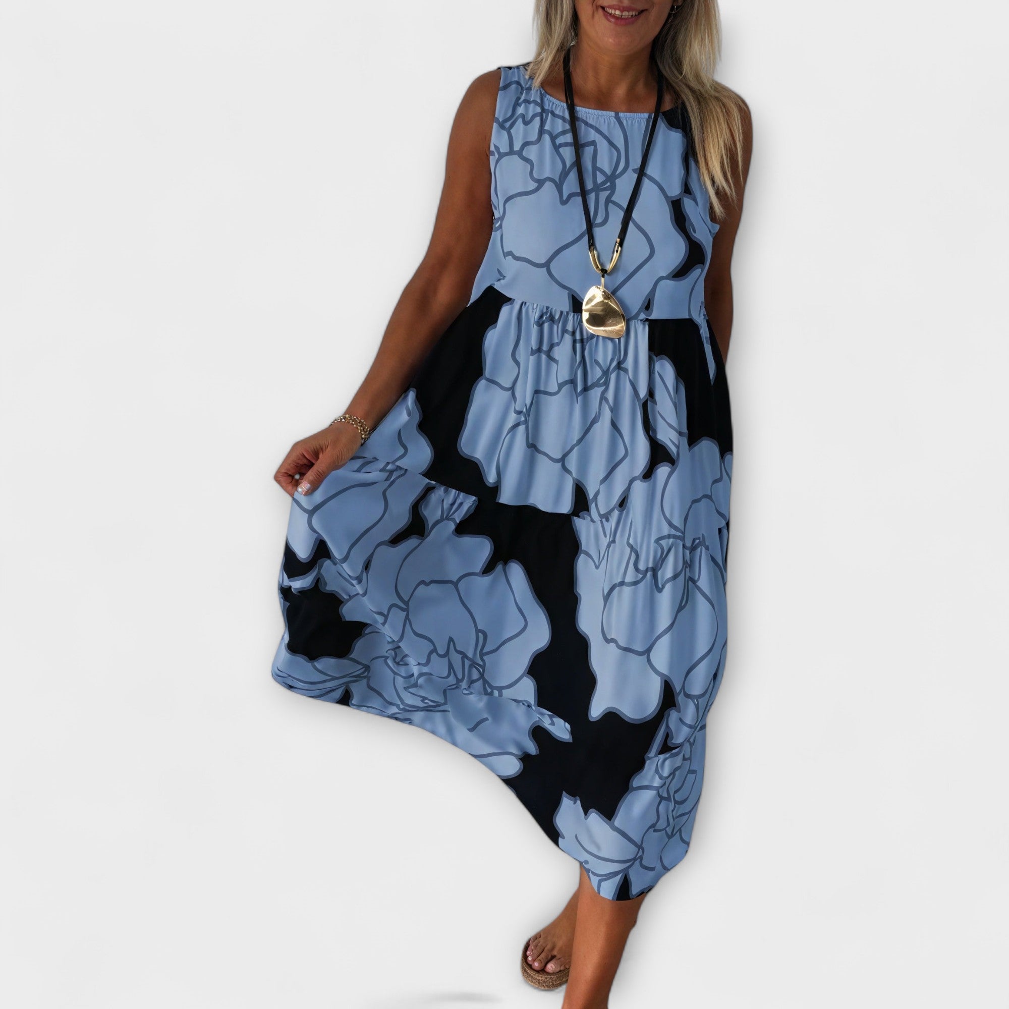 Robe midi à fleurs avec jupe à volants