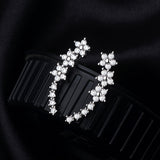 Boucles d'oreilles en strass florales luxueuses