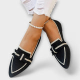 Chaussures plates pour femmes avec design noué