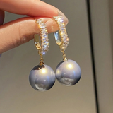 Boucles d'oreilles élégantes avec accents de perles