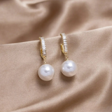 Boucles d'oreilles élégantes avec accents de perles