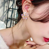 Boucles d'oreilles avec des pierres colorées