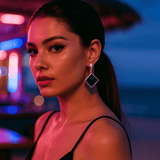 Boucles d'oreilles avec des pierres précieuses noires carrées
