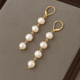 Boucles d'oreilles avec pendentif et perle