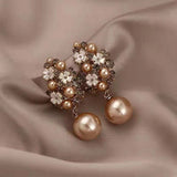 Boucles d'oreilles élégantes avec perles florales