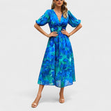 Clara - Robe midi à fleurs élégante