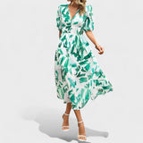 Clara - Robe midi à fleurs élégante