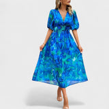 Clara - Robe midi à fleurs élégante