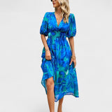 Clara - Robe midi à fleurs élégante