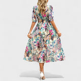 Clara - Robe midi à fleurs élégante