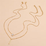 Ensemble de colliers vintage avec pendentif doré