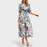 Clara - Robe midi à fleurs élégante