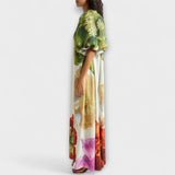 Skylar - Robe maxi à imprimé floral, col asymétrique et manches bouffantes