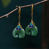 Boucles d'oreilles éléphants verts rétro