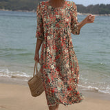 Sara - Robe maxi à col rond et imprimé floral