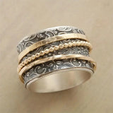Bague rotative dans le style baroque vintage